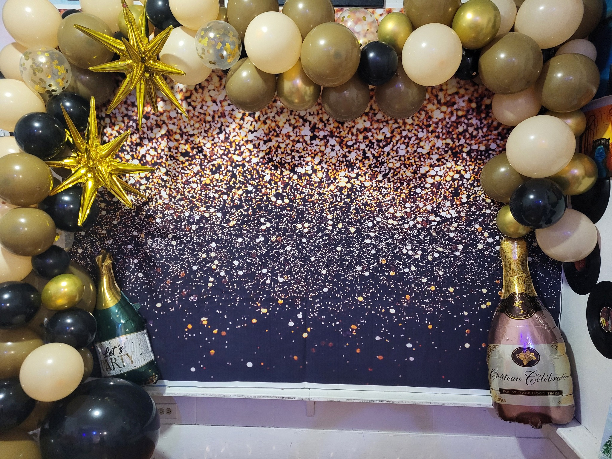 Elegant party backdrop with gold balloons, sparkling sequin wall, and themed event décor setup created for customized paint parties, birthdays, girls nights, bridal showers, and special event experiences in Lafayette Louisiana.