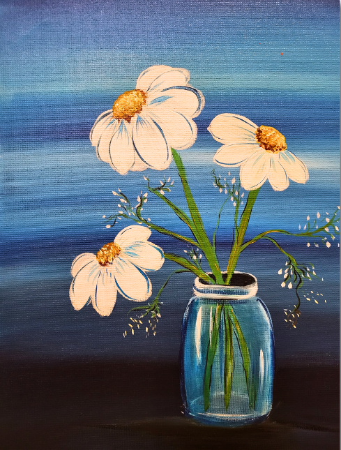 White daisies arranged in a blue glass vase against a softly blended blue background