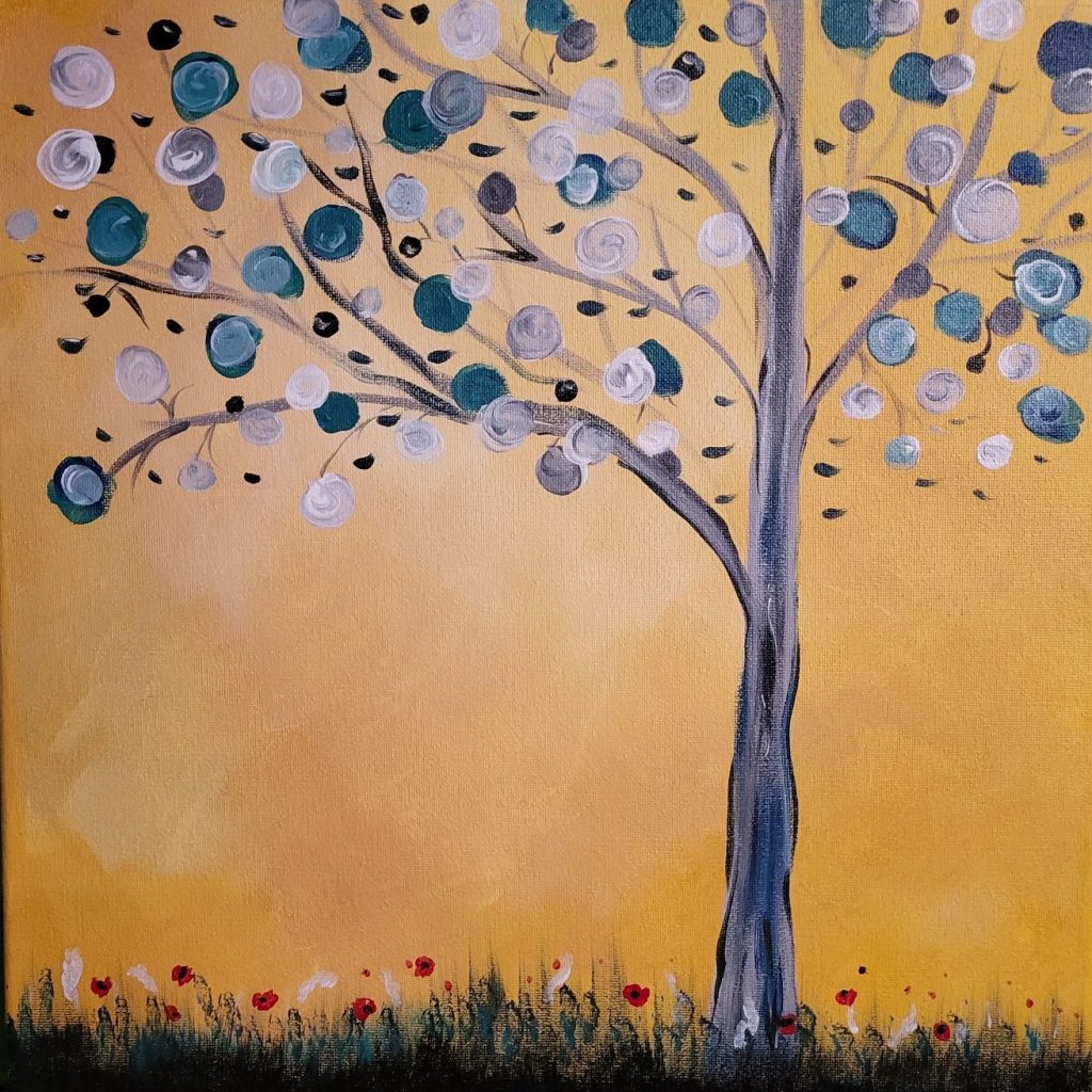 Decorative flowering tree with small wildflowers on a warm golden background