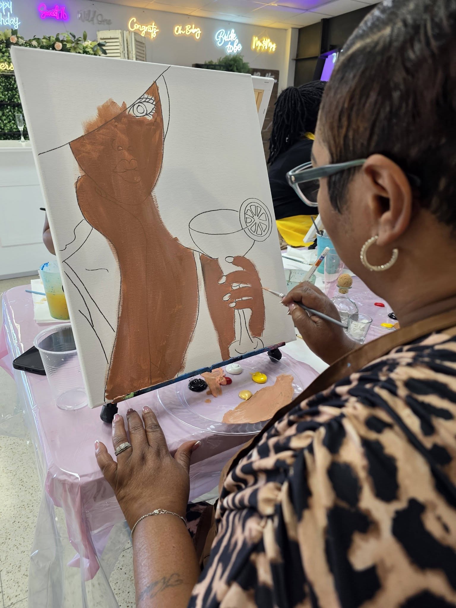 Guests enjoying a painting session at Lafayette Paint Party